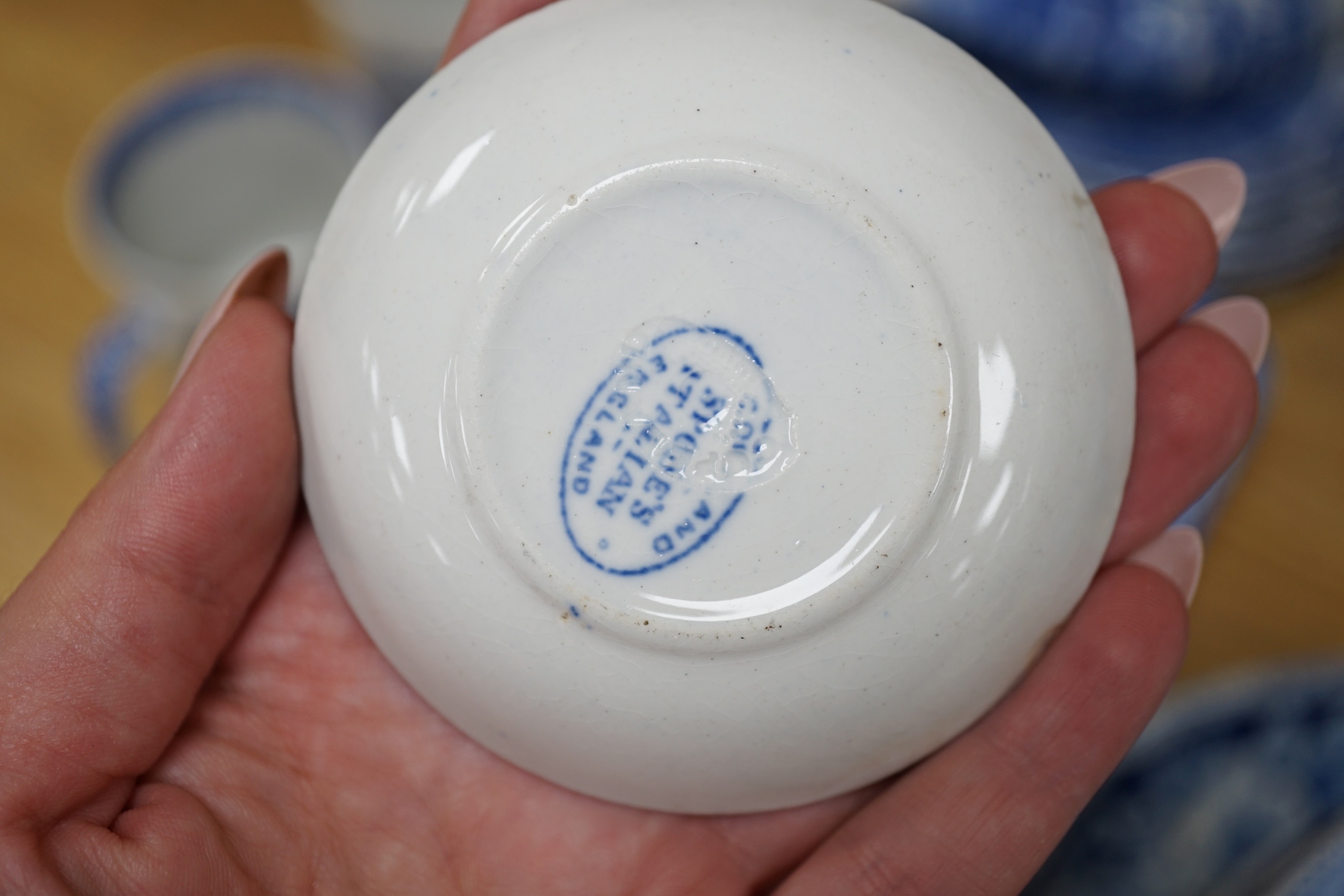 A collection of blue and white Spode Italian dinnerware to include mugs, plates and lidded tureen, largest 37cm wide. Condition - poor to fair